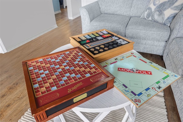 Combination board game sets. Scrabble and one that includes Clue, Monopoly, checkers and Cribbage!