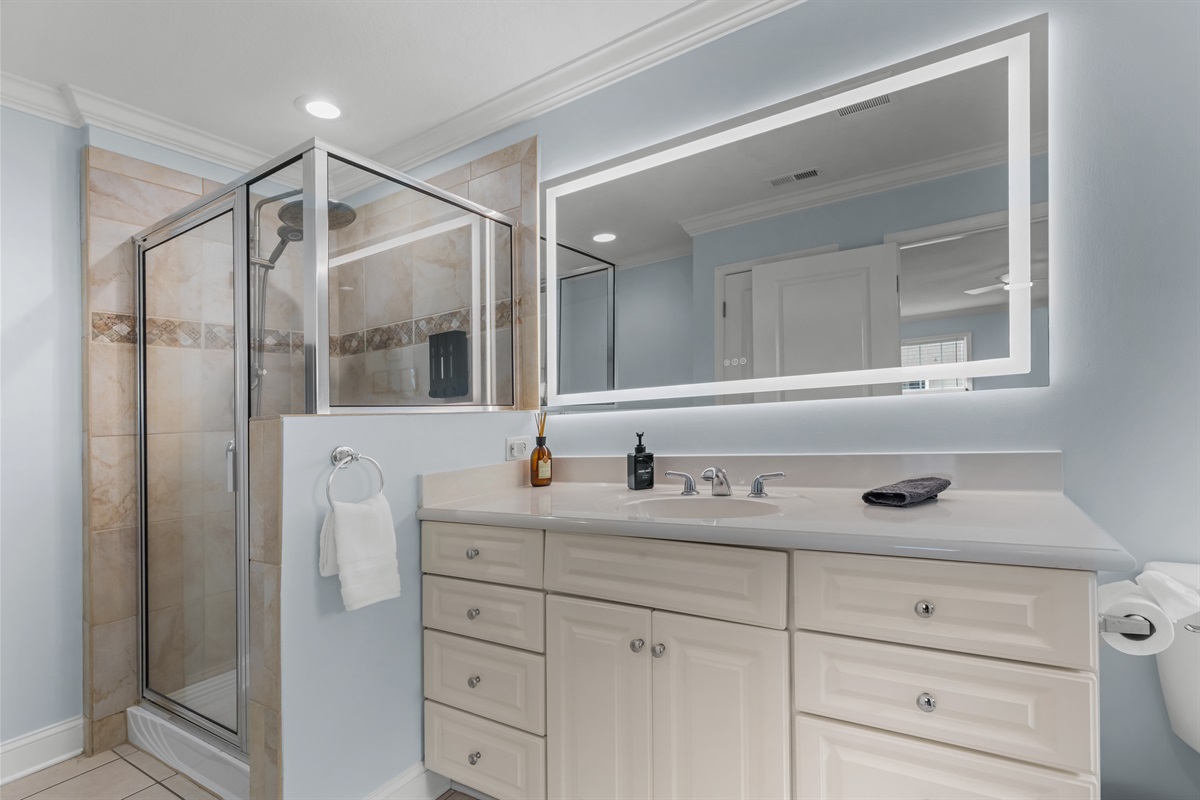 Walk in shower primary suite upper level