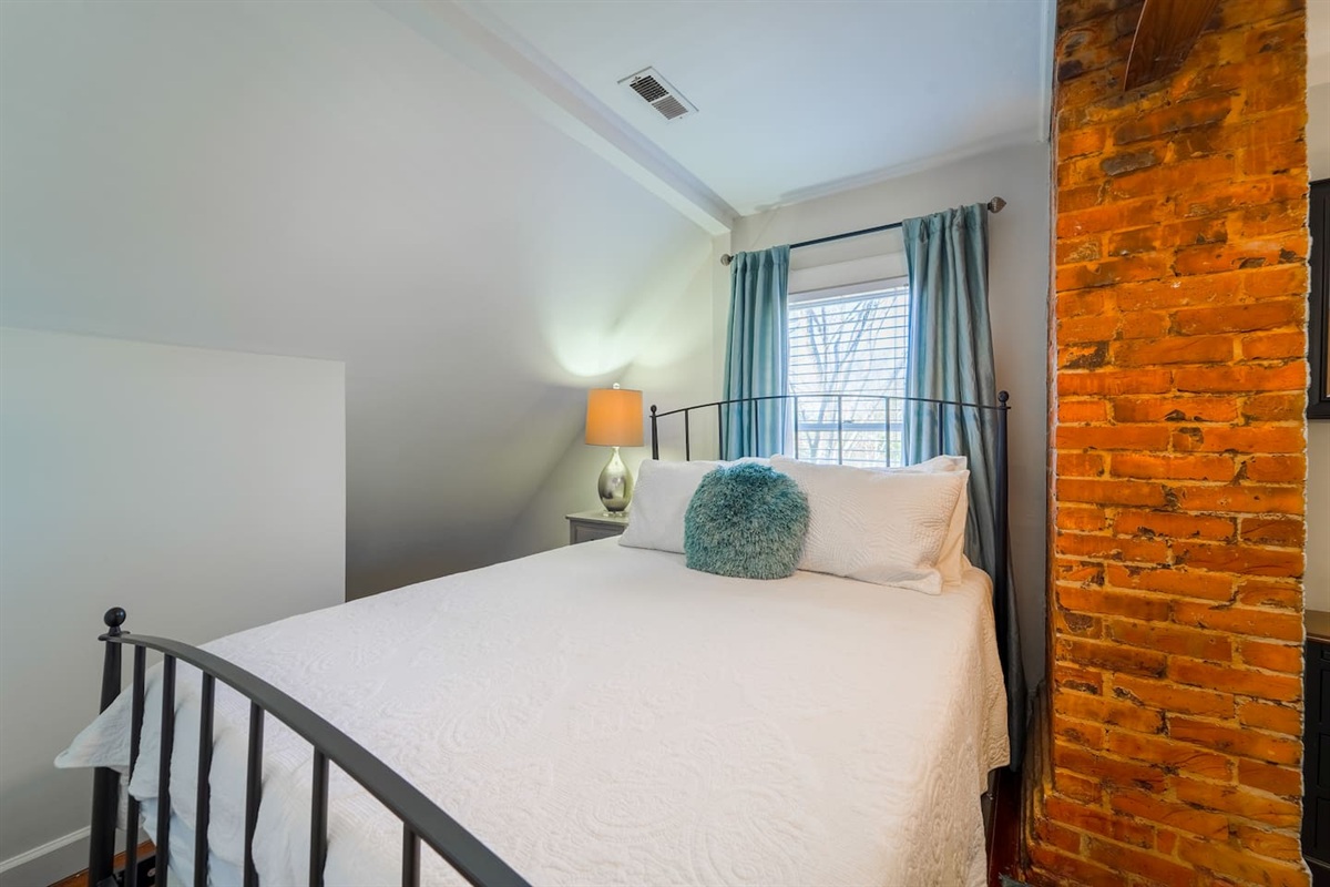 Convenient bedside table and lamp.