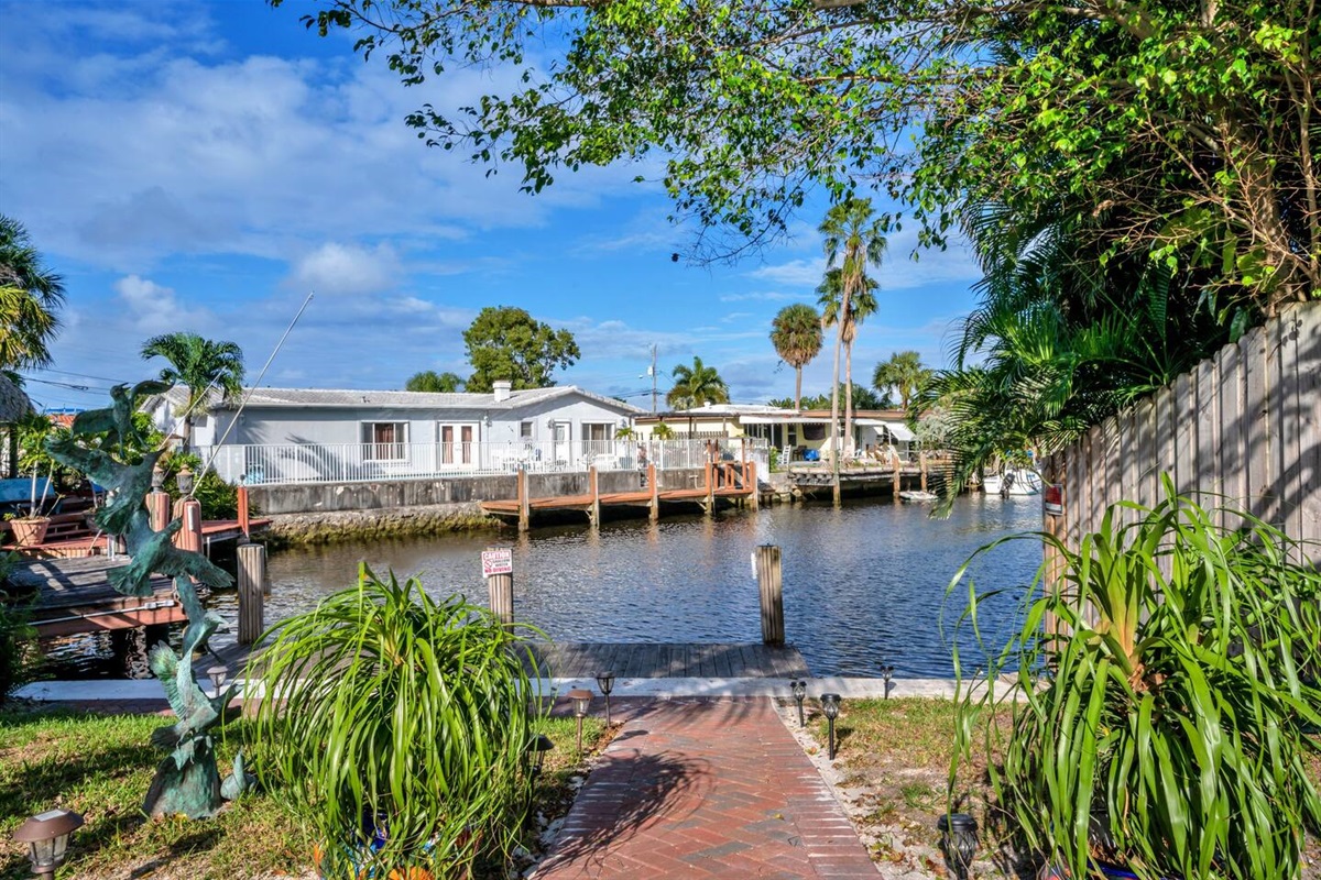 Watch mullet jump, chased by rolling tarpon, see an iguana swim by, or a friendly manatee pop up. Ponder cruising on the  paddleboards or just relax!