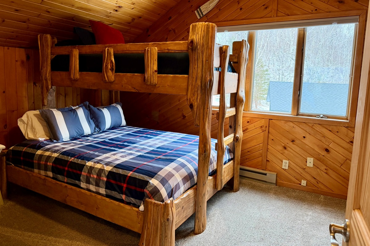 Right off the bathroom and top of the stairs you'll step into the second floor bedroom.
