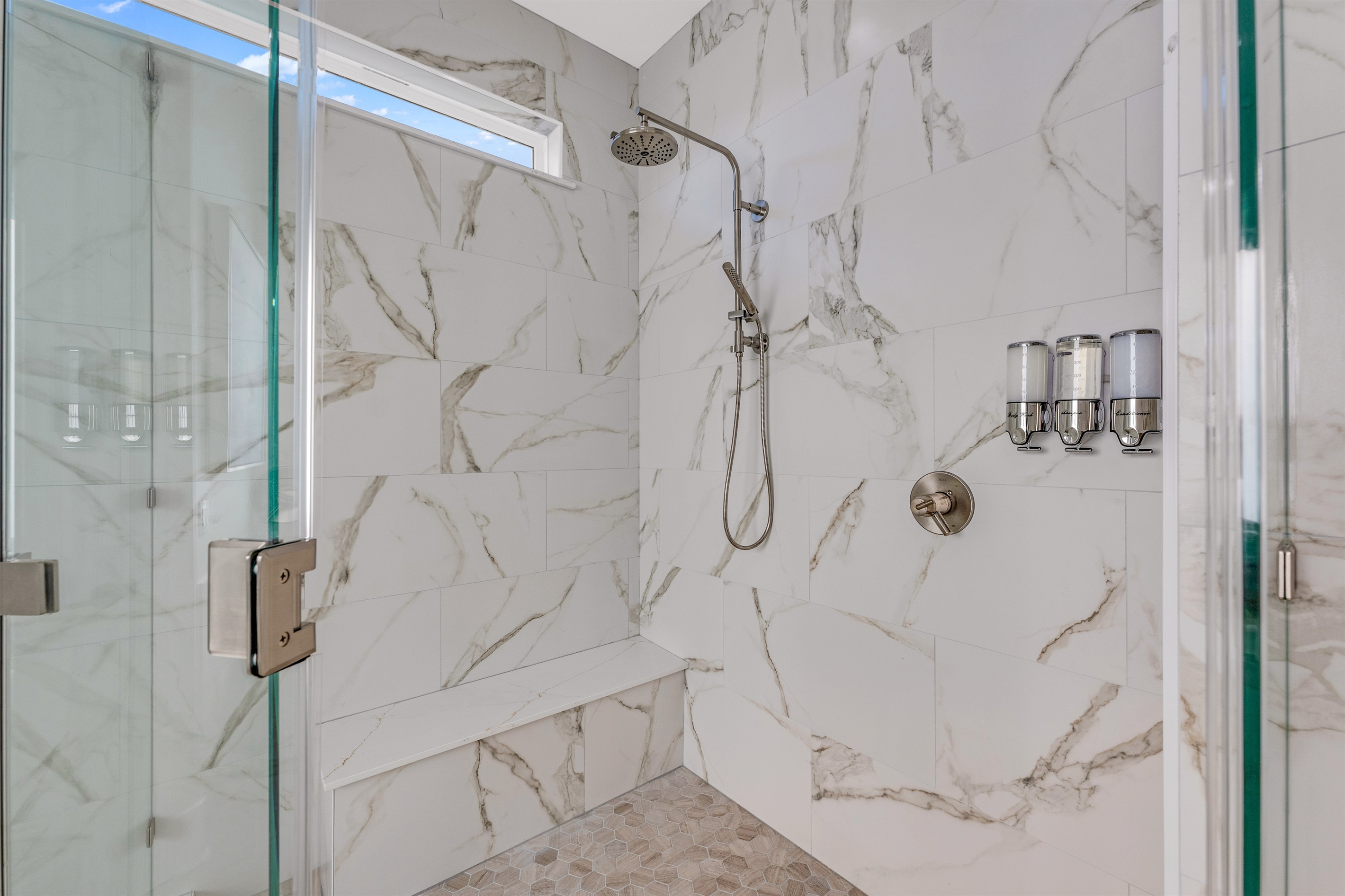 Costa Cristal Primary Ensuite: Enjoy a contemporary bathroom with a sleek shower, combining style and practicality for your daily routine.