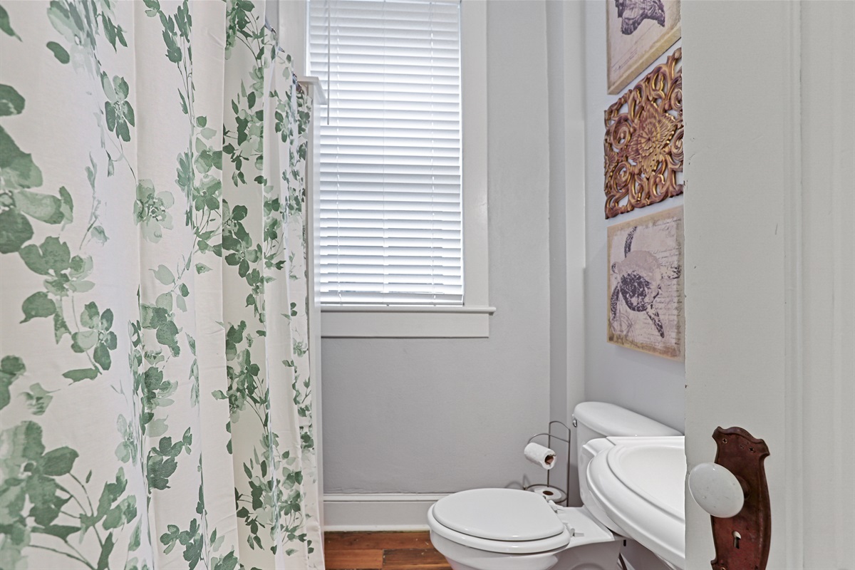 A full bath with a tub/shower combo—perfect for relaxing or rinsing off the day.