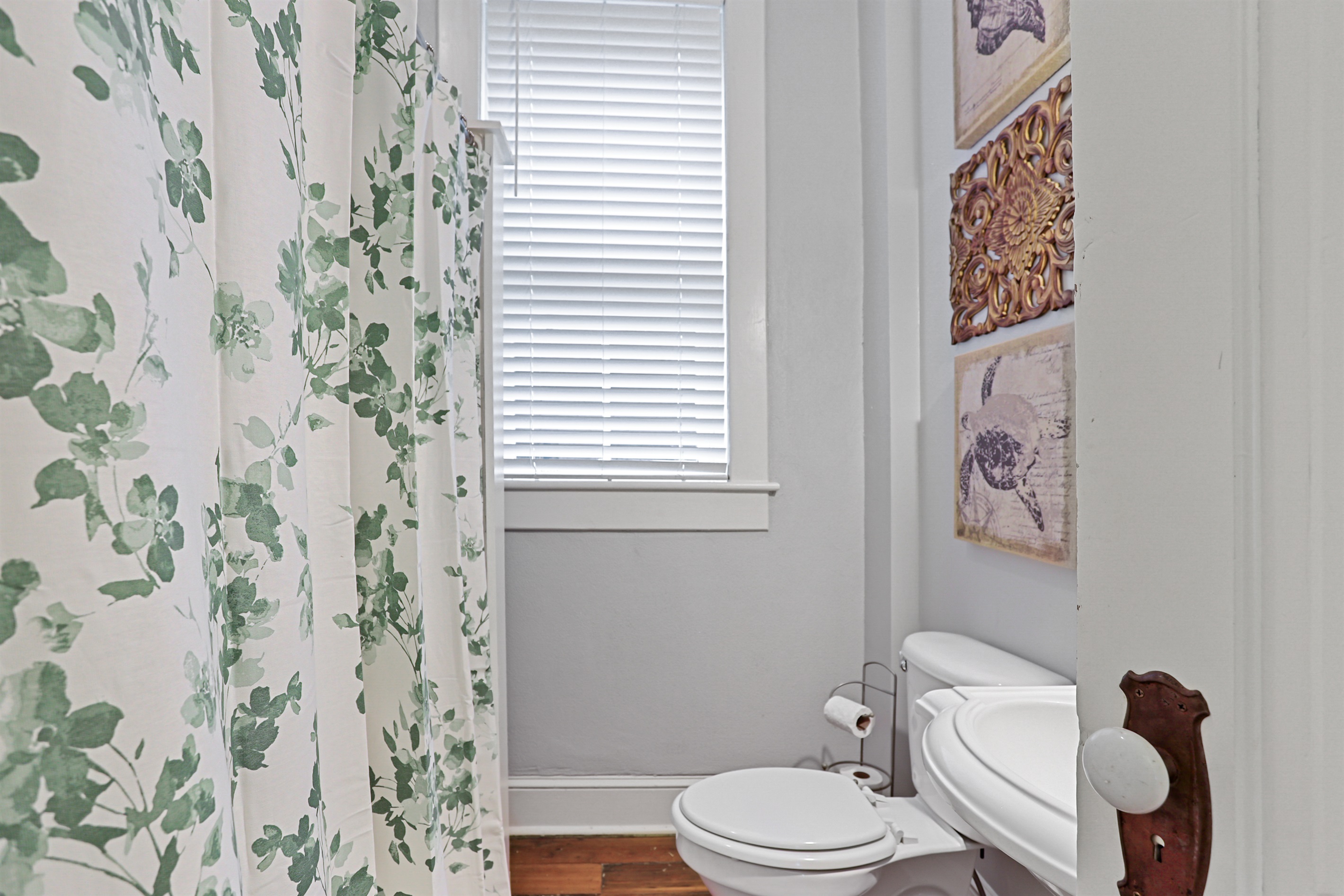 A full bath with a tub/shower combo—perfect for relaxing or rinsing off the day.