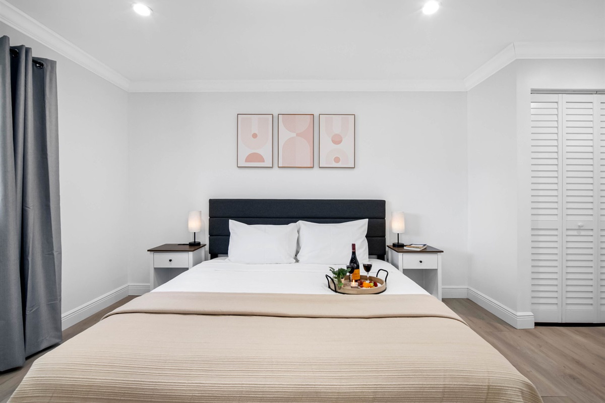 This bedroom doesn’t just look great—it’s designed for comfort, productivity, and total relaxation.