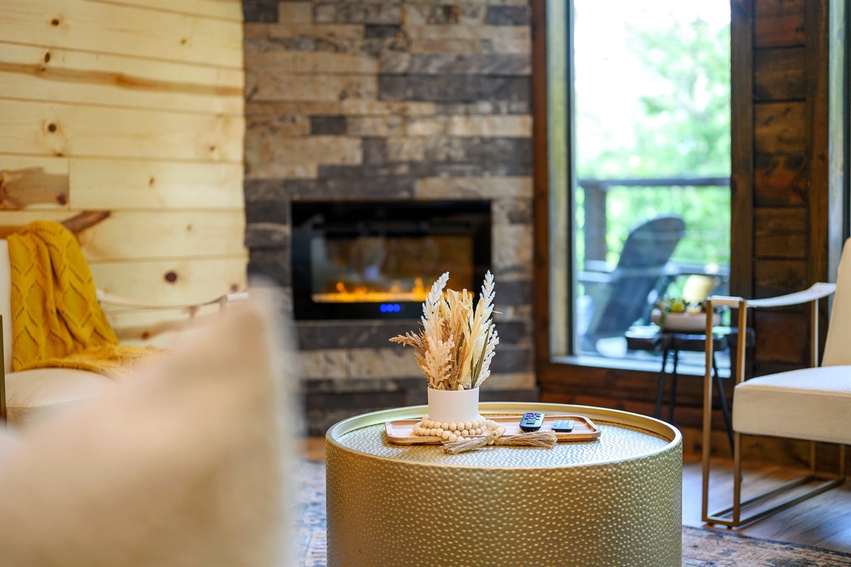 Electric fireplace and Smart TV in the living area.