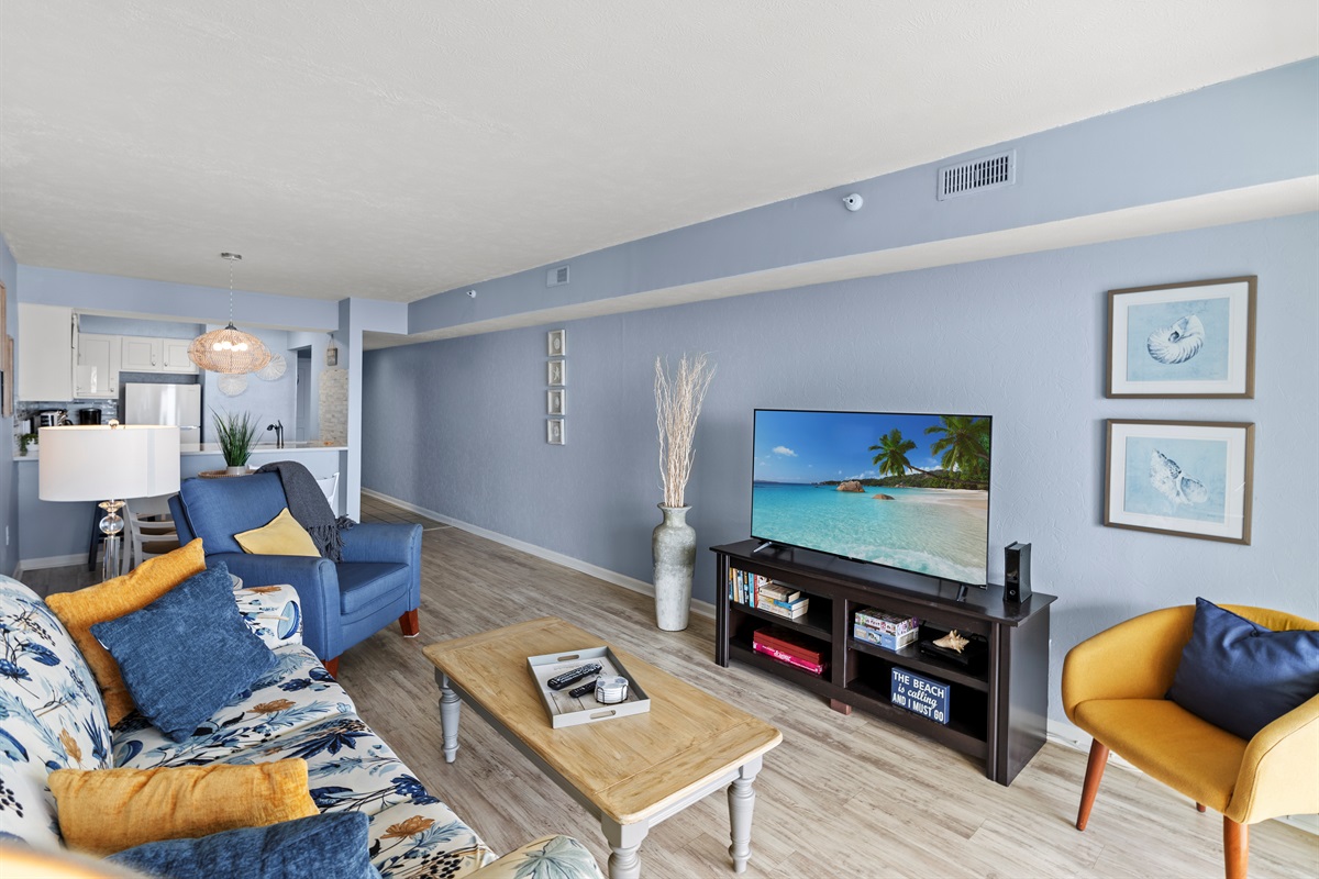 Oceanfront Living room with balcony access