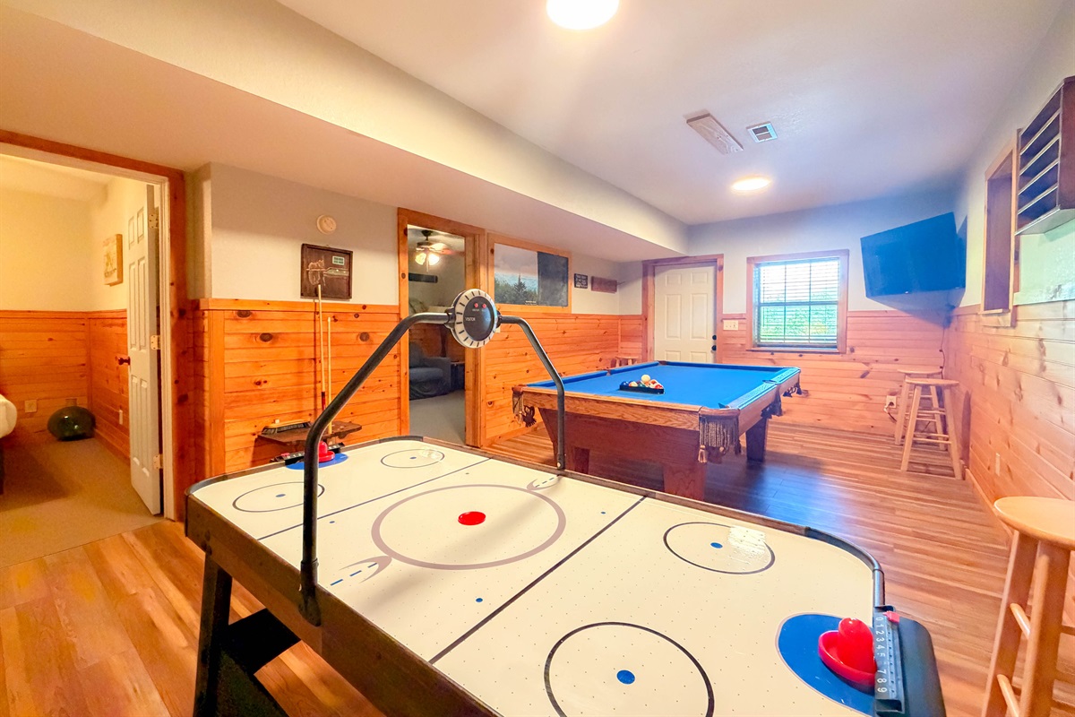 Everyone will love the lower level game room. Billiards and Air Hockey!