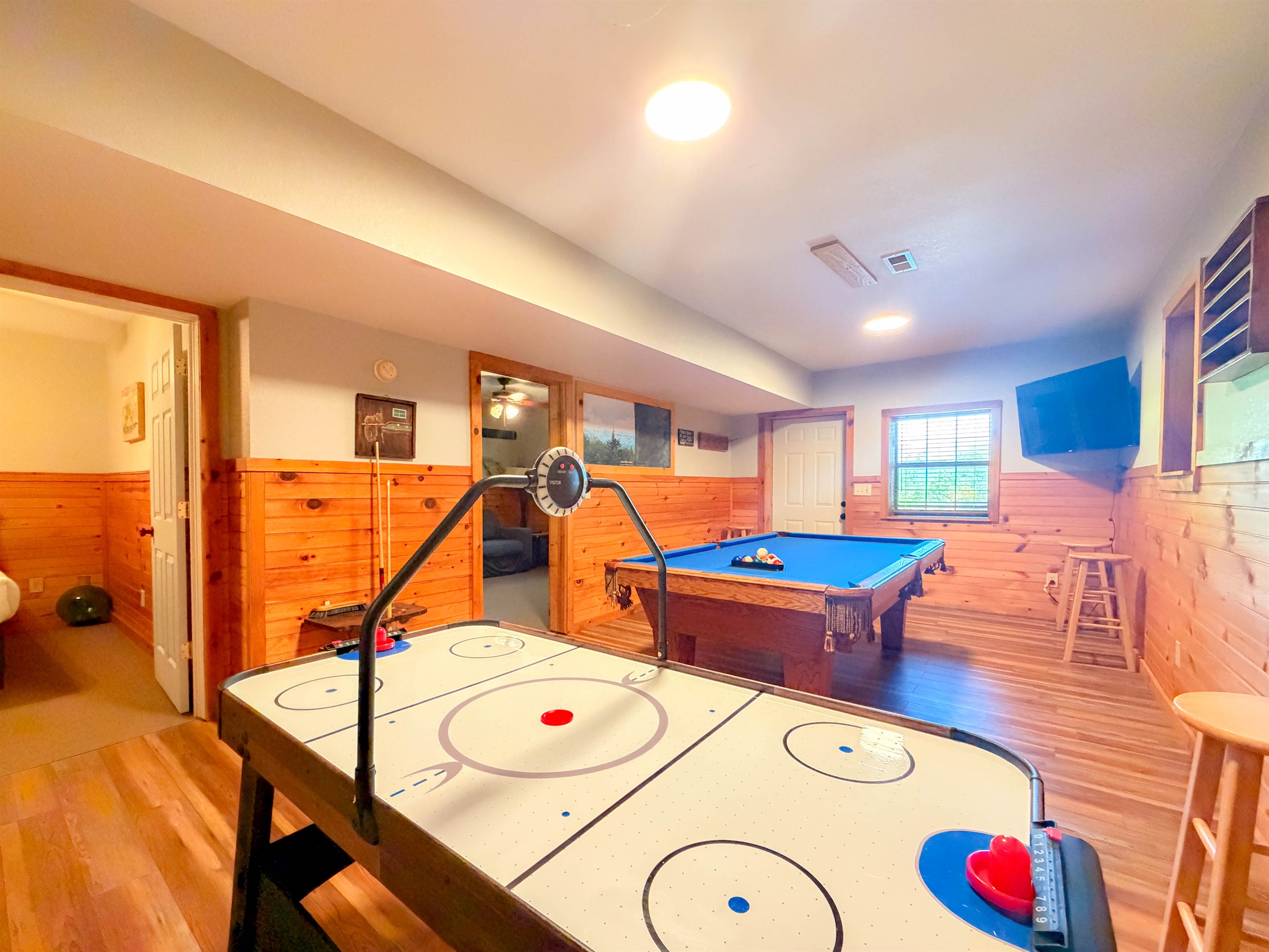 Everyone will love the lower level game room. Billiards and Air Hockey!