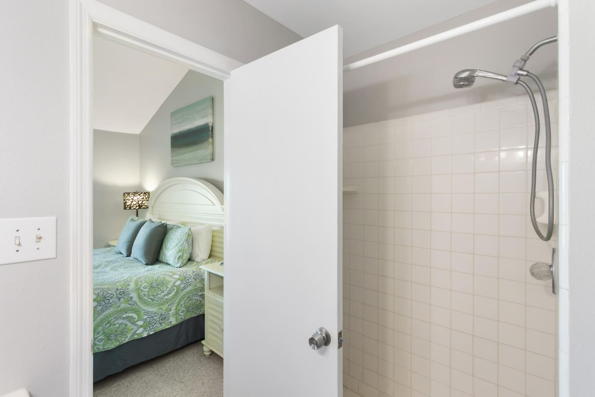 Step into the tiled master shower after a long beach day and feel the day dissolve &mdash; this is what you came here for.