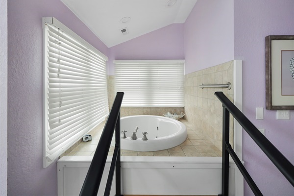 En-suite luxury with tub and shower — comfort meets convenience.