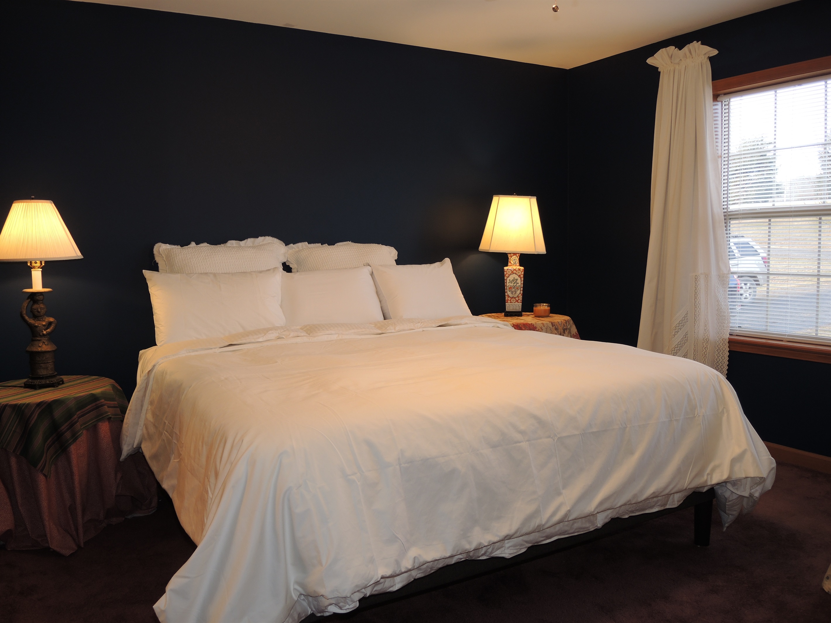 Primary bedroom w/ king bed