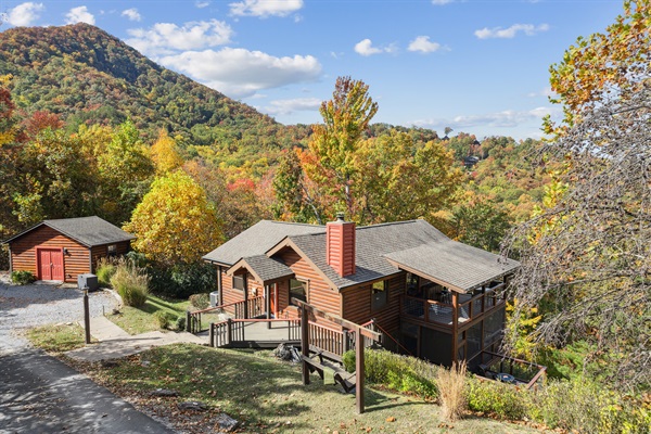 Escape to the serene beauty of the Smoky Mountains with this private cabin nestled on a hilltop