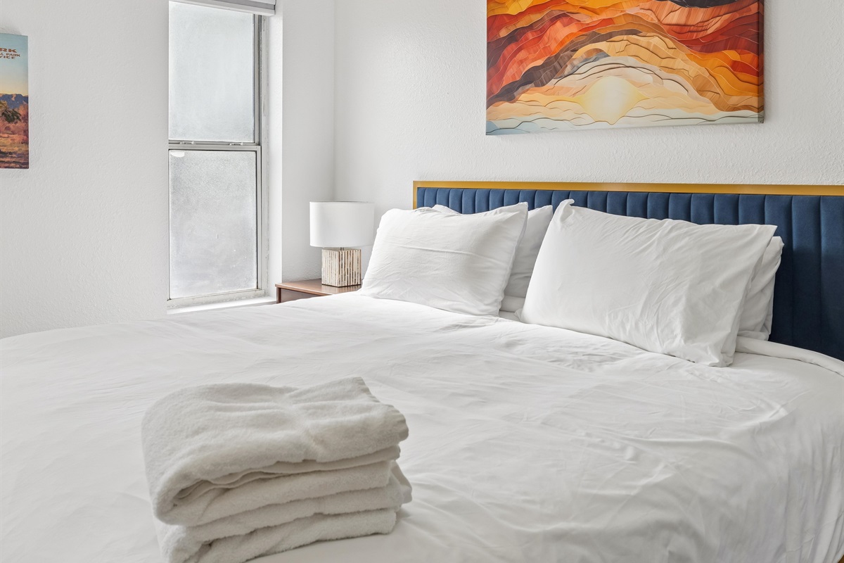 Cozy sleeping area with a king bed for restful nights