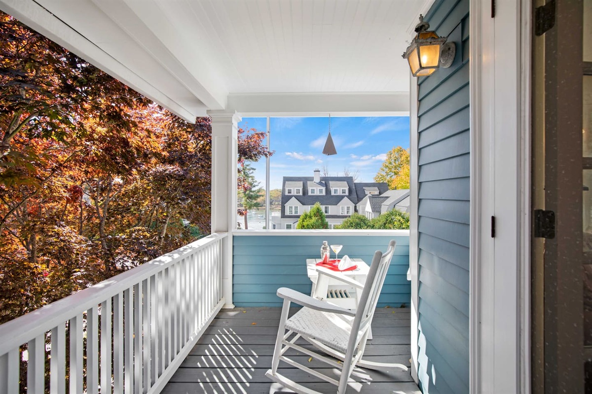 Outside balcony access with outdoor seating and dining!