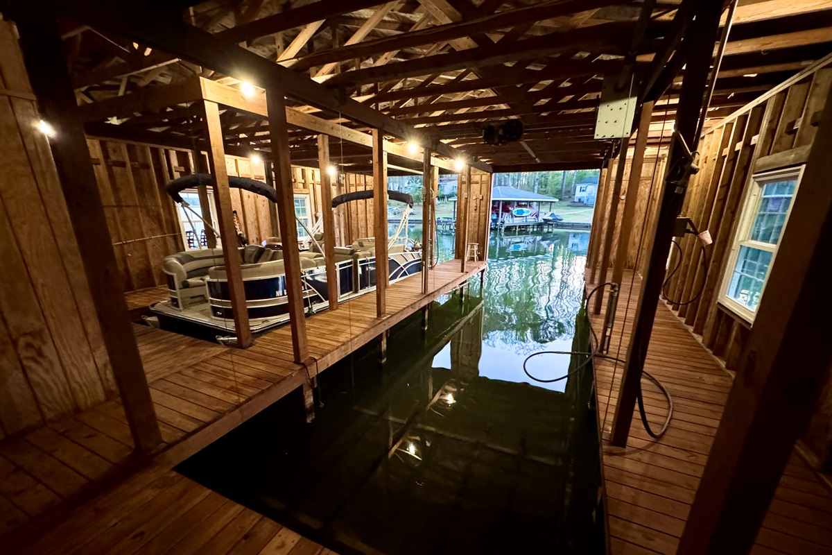 Second covered boat slip with room for two jet skis on the lift and your boat on the lift. 