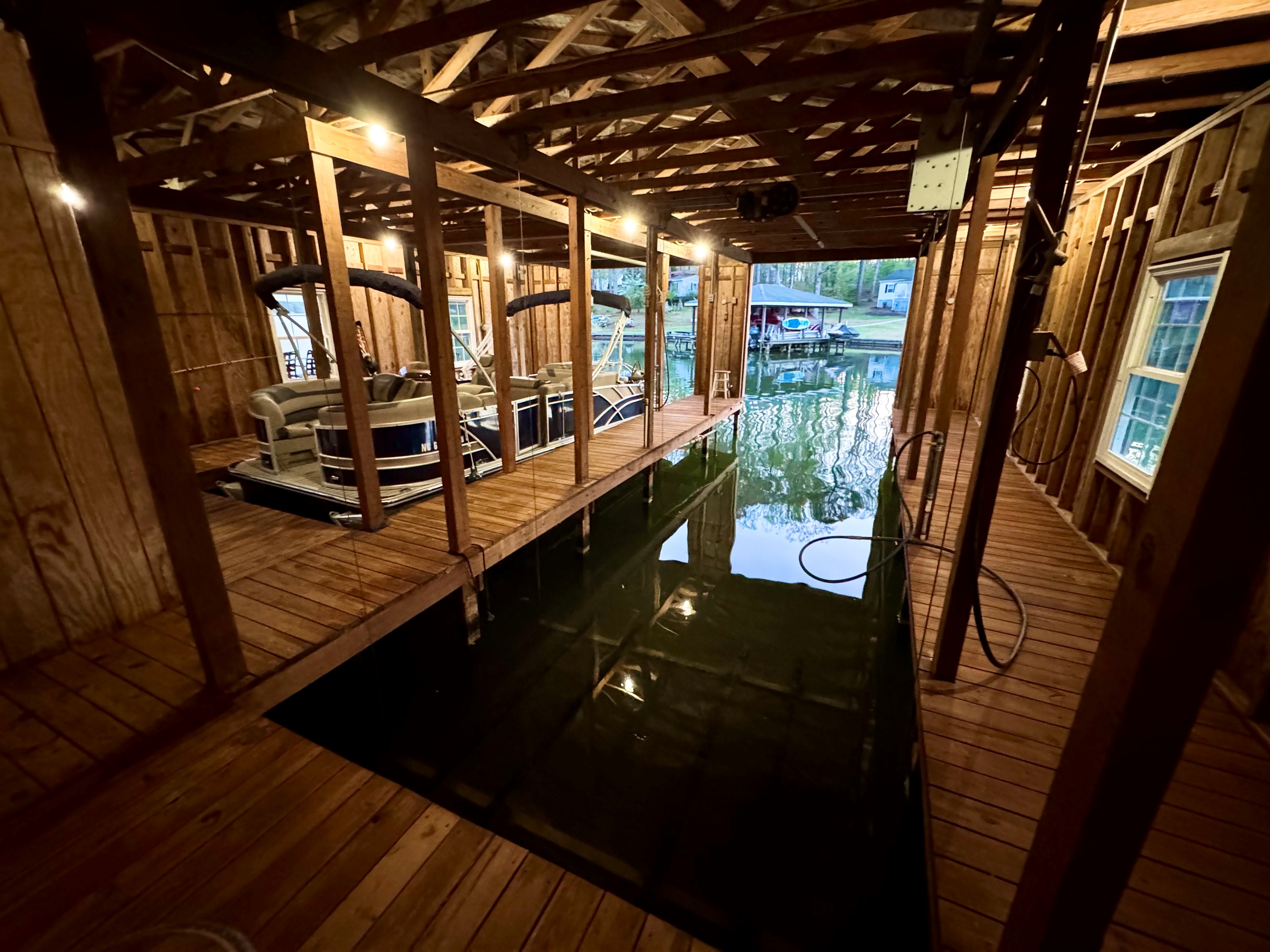 Second covered boat slip with room for two jet skis on the lift and your boat on the lift. 