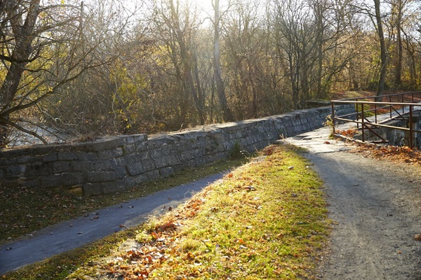 Chesapeake & Ohio Canal National Historic Park Antietam Aqueduct, 1/2 mile away.
The park is flat with a soft pave for bicycles & easy walking. 
Tours will start here. 