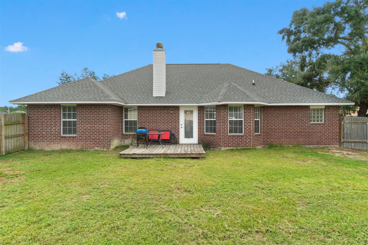 With a fully fenced yard and a quiet neighborhood setting, this outdoor space is ideal for relaxing or letting kids and pets play freely.