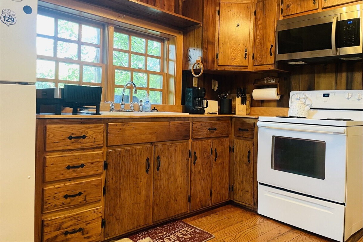 The kitchen is stocked to prepare meals in house.