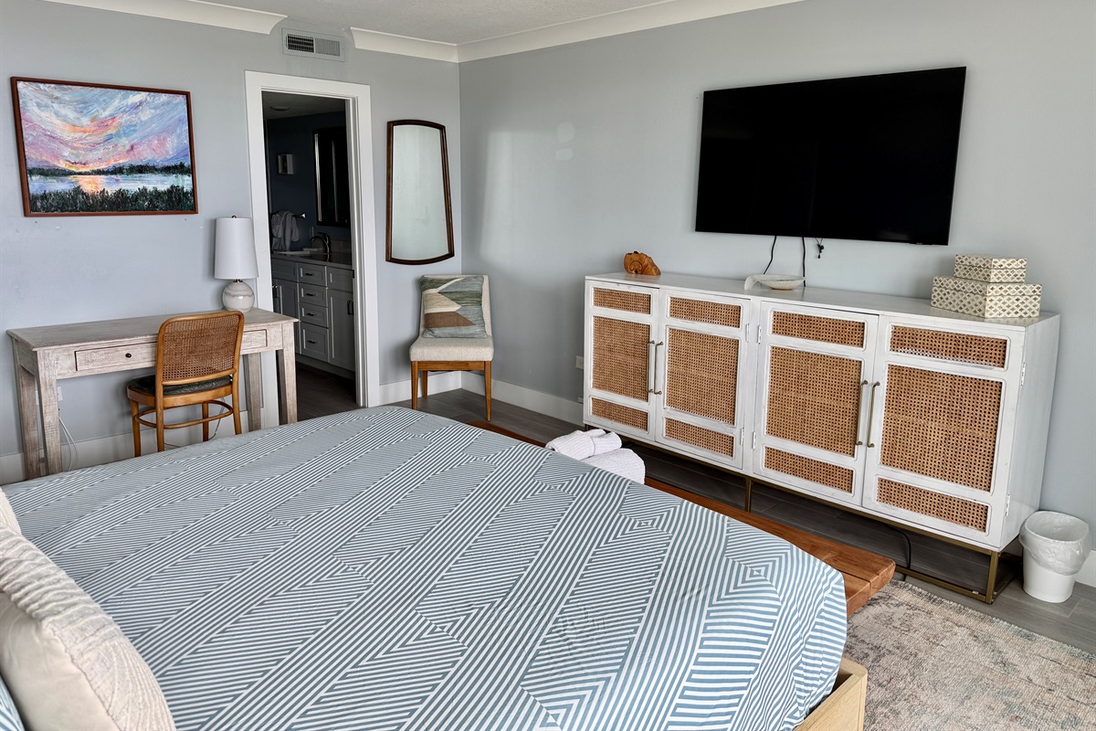 Primary Bedroom with En Suite Bath and Walk In Closet, Desk and Smart TV