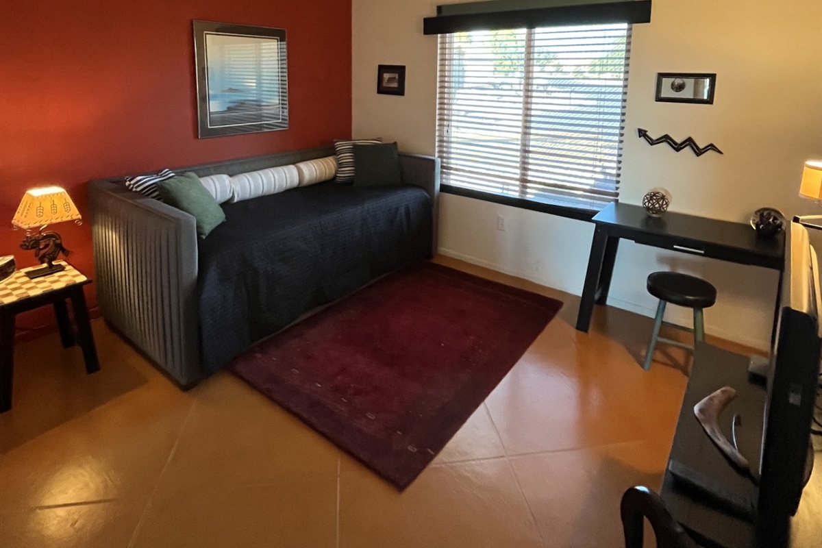 Guest bedroom offers a day bed, which is two twin beds