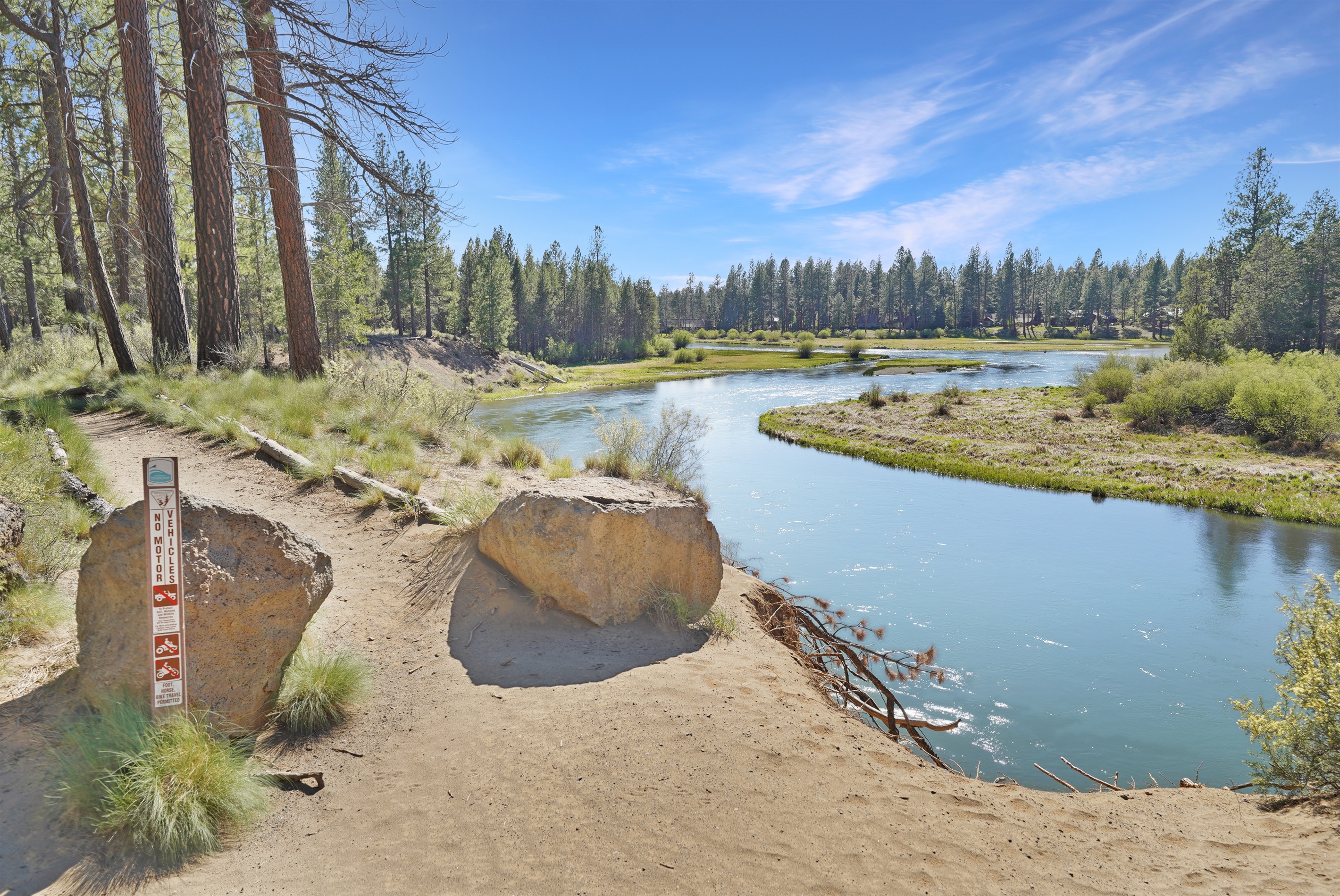 Riverfront trails and recreation directly outside the property