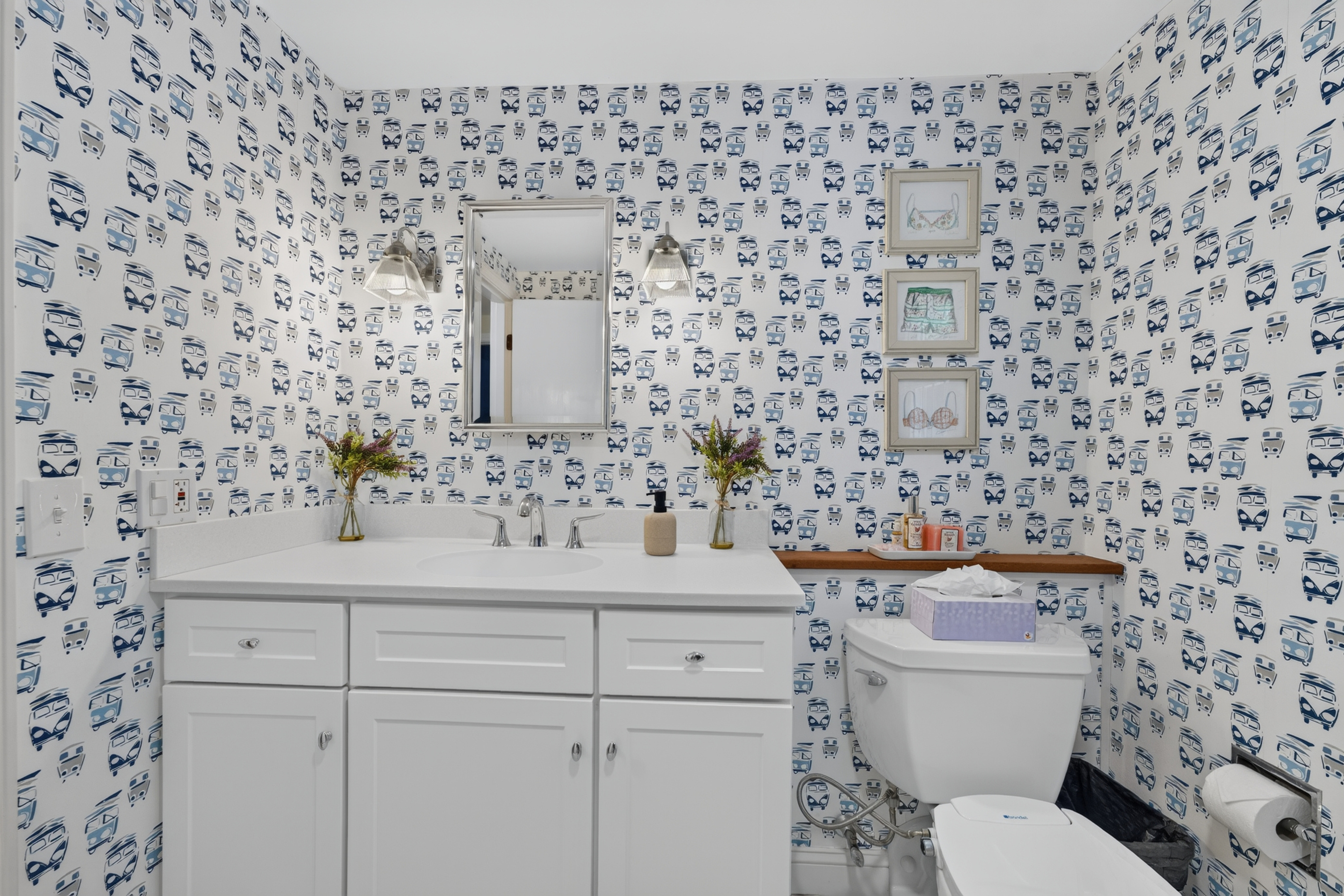 Fresh, coastal-inspired bathroom with plenty of space to get ready.