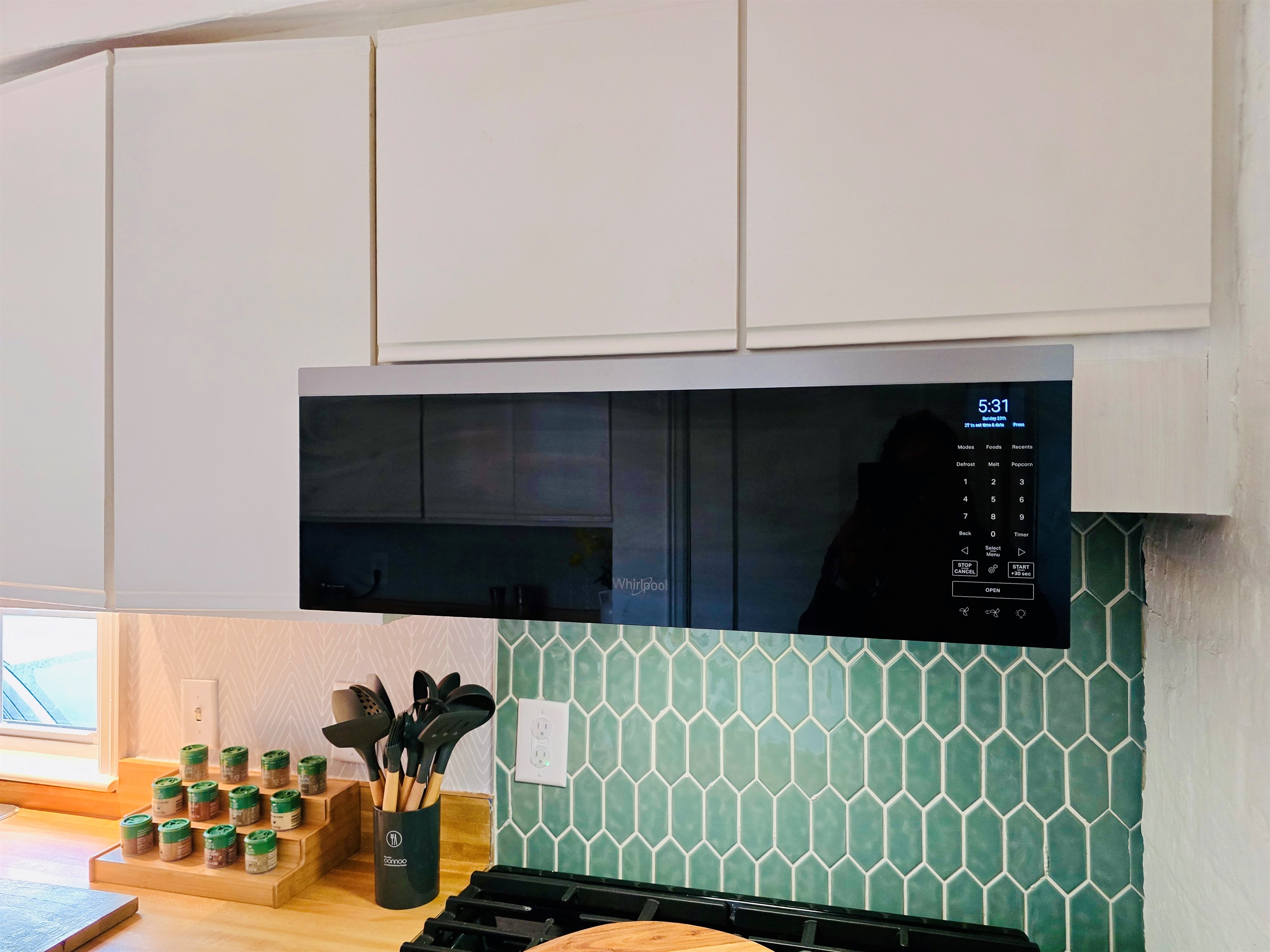 Cook in style—our smart stainless range, tile backsplash, and microwave hood make meals effortless. Stocked spices and generous cookware spark your culinary creativity.