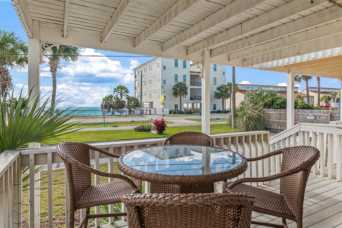 Gulf views from the covered 1st floor patio - plenty of space of dining and relaxing!