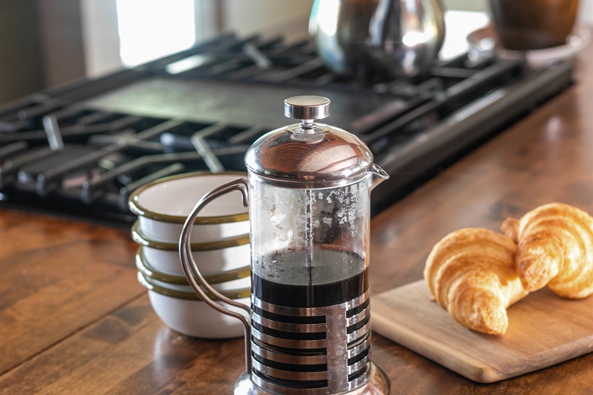The morning starts slow and peaceful with a French press on the table, filling the room with the rich aroma of fresh coffee.