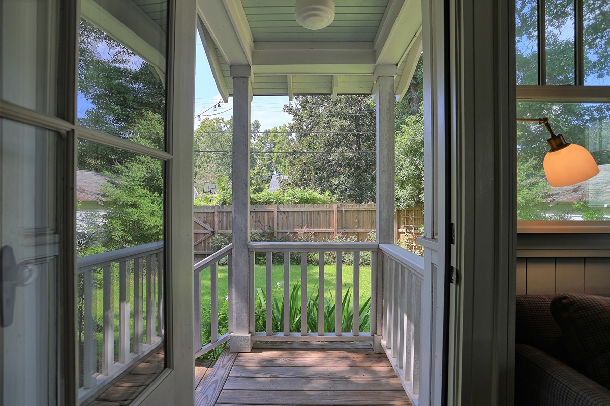 Open the door and step into a peaceful backyard oasis designed for relaxation and quiet moments.