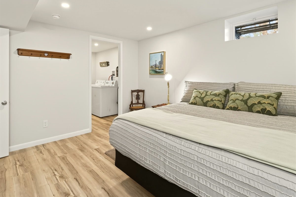 Lower level king bedroom with access to laundry room and full bathroom