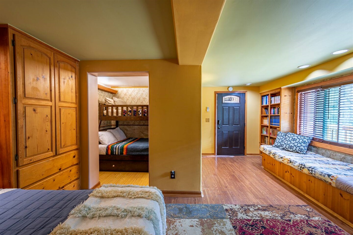 Downstairs bedroom with Full size bed, bunk bed and Alcove sleeping space