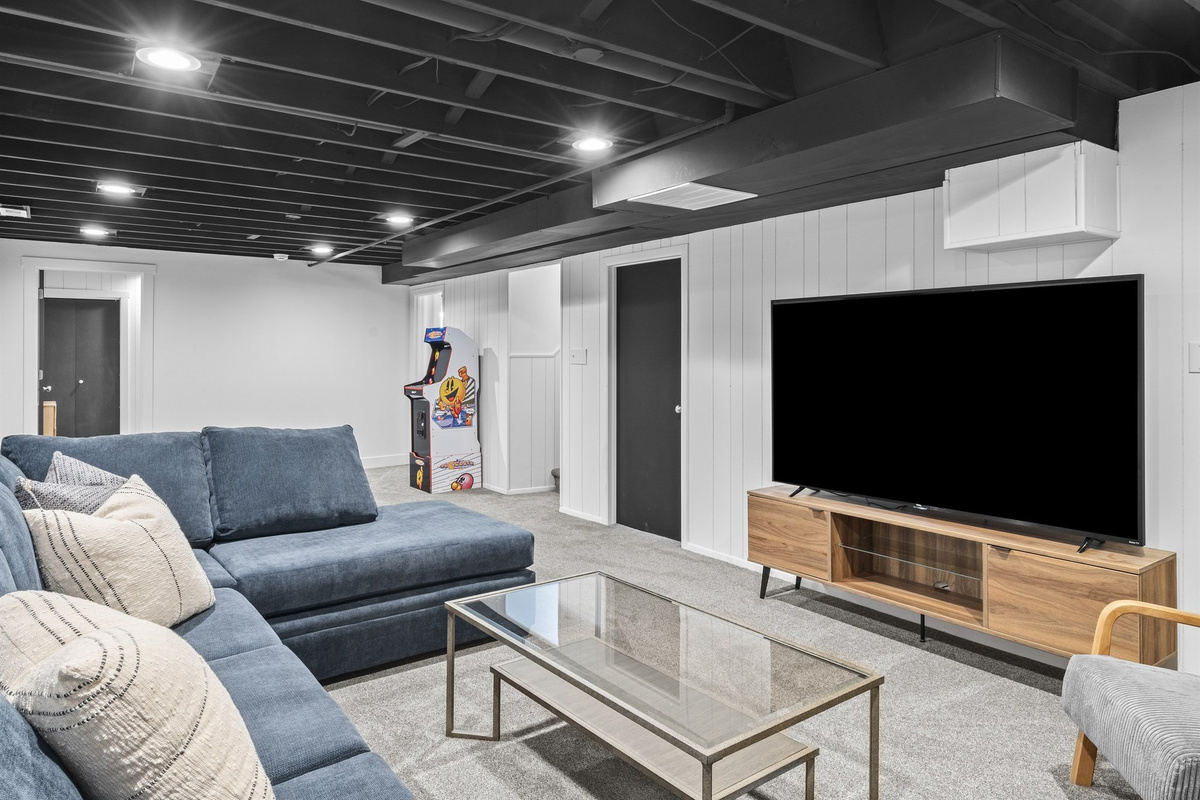 Retro Retreat: Basement Family Room with Fireplace
