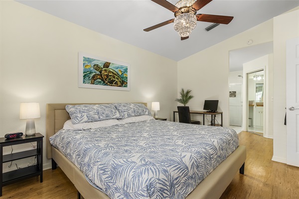 Master bedroom with workstation and master bathroom.