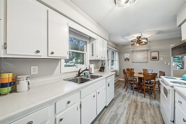 Enjoy the fully-stocked upper kitchen for cooking, dining or making cookies!