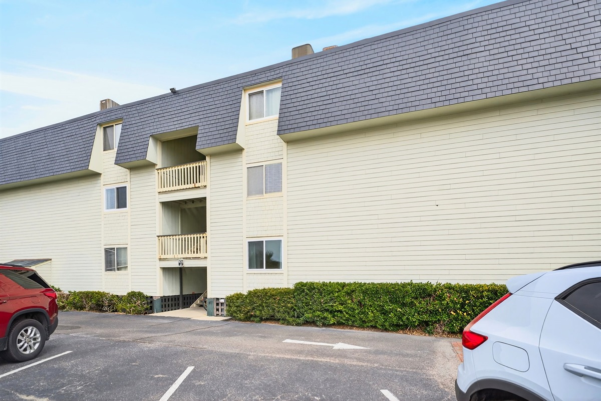 Exterior of Building | Beach Break | IOP Escapes Vacation Rentals | 1400 Ocean Blvd 106B, Isle of Palms SC