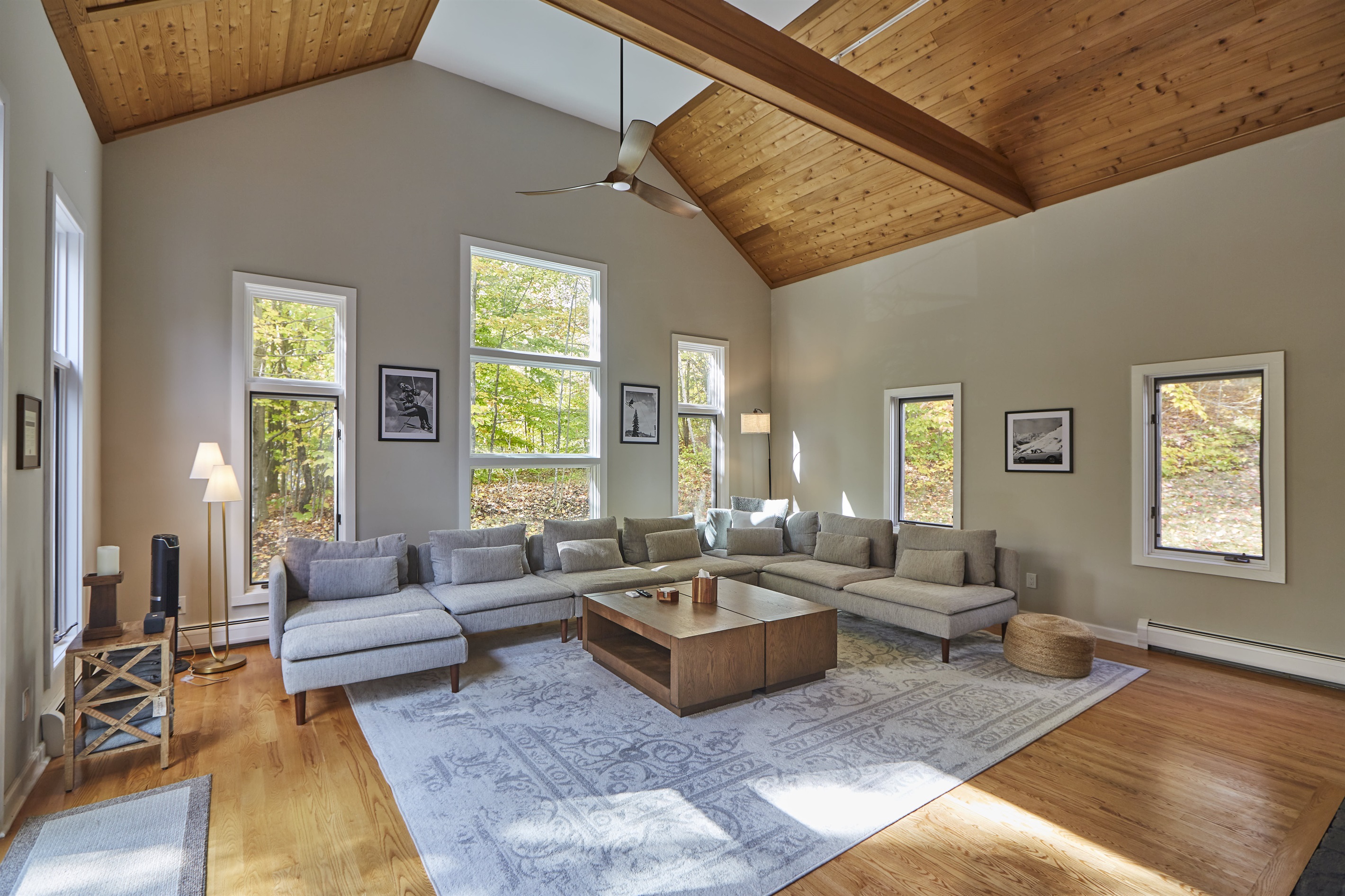 This extra large living room with a wood-burning fireplace and cozy sectional is perfect for gathering with friends and family.