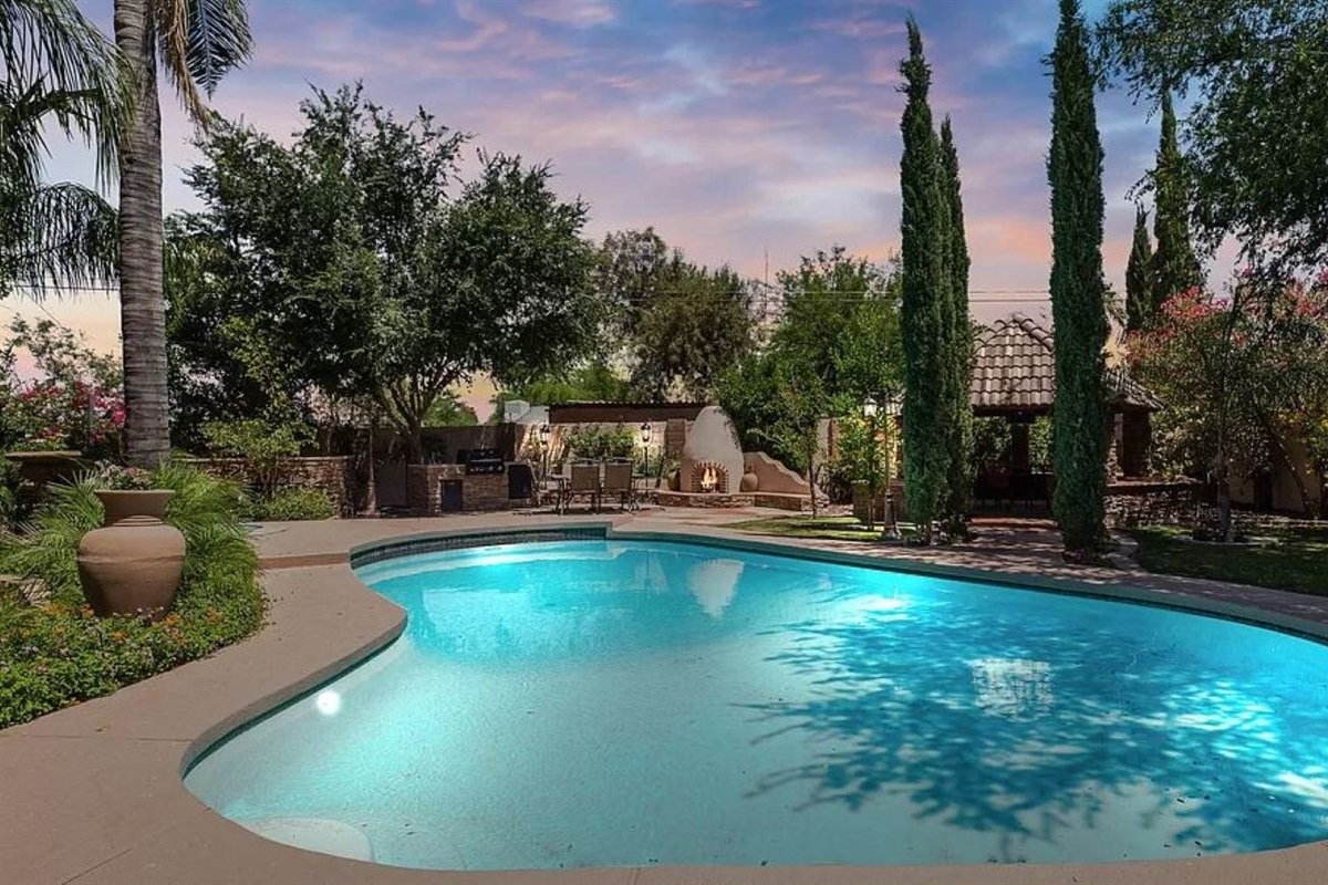 Escape to your heated pool, surrounded by peaceful trees, and indulge in ultimate relaxation.