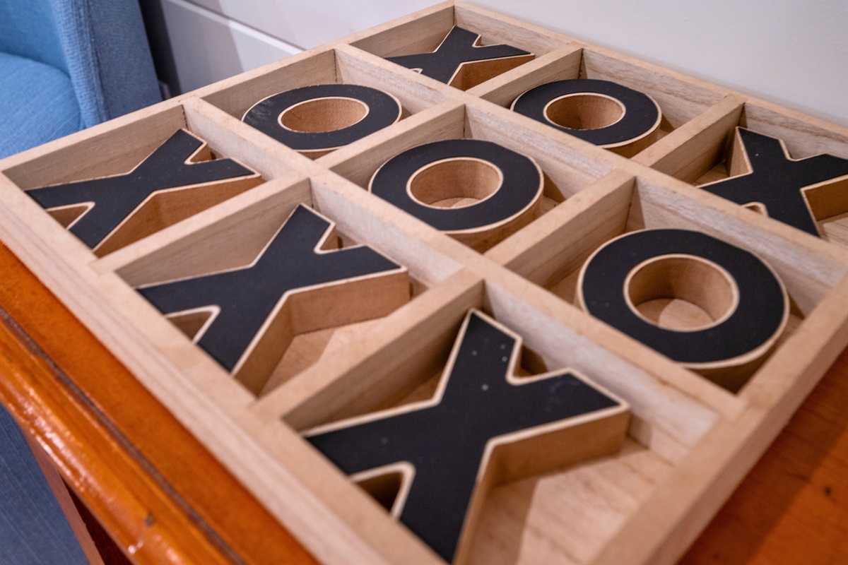 Classic tic-tac-toe game for cozy cabin entertainment.