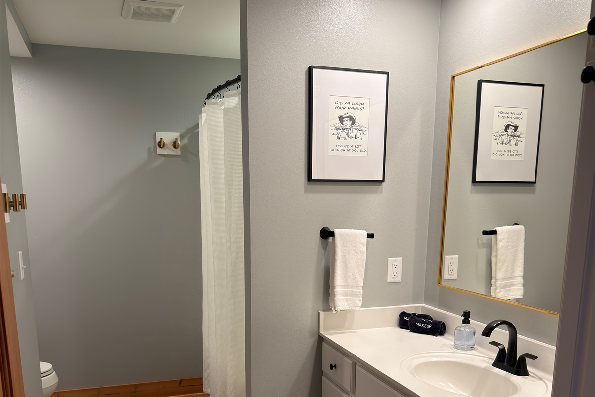 Lower Level bathroom allows easy access to a restroom while using the outdoor fire pit.