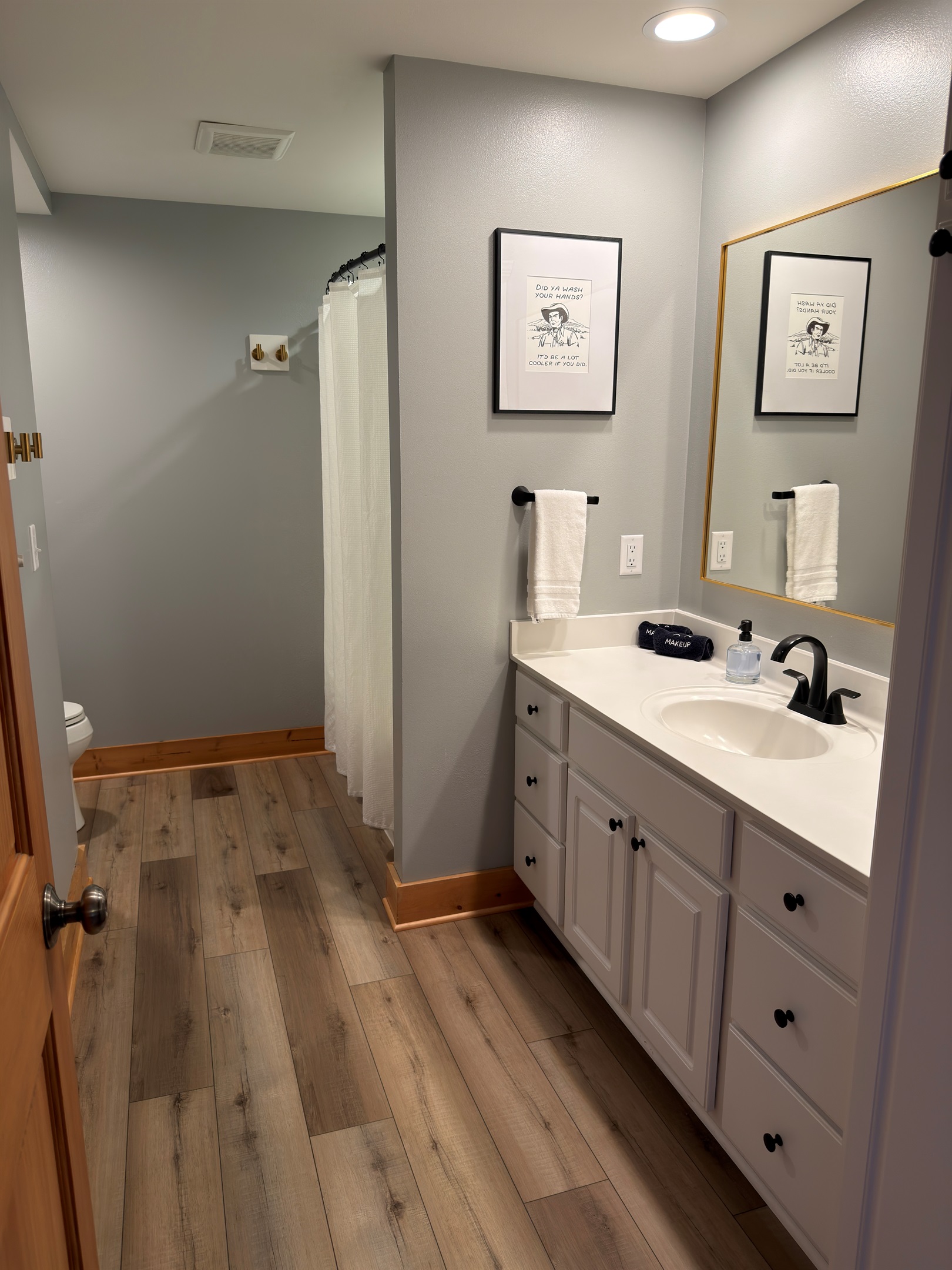 Lower Level bathroom allows easy access to a restroom while using the outdoor fire pit.