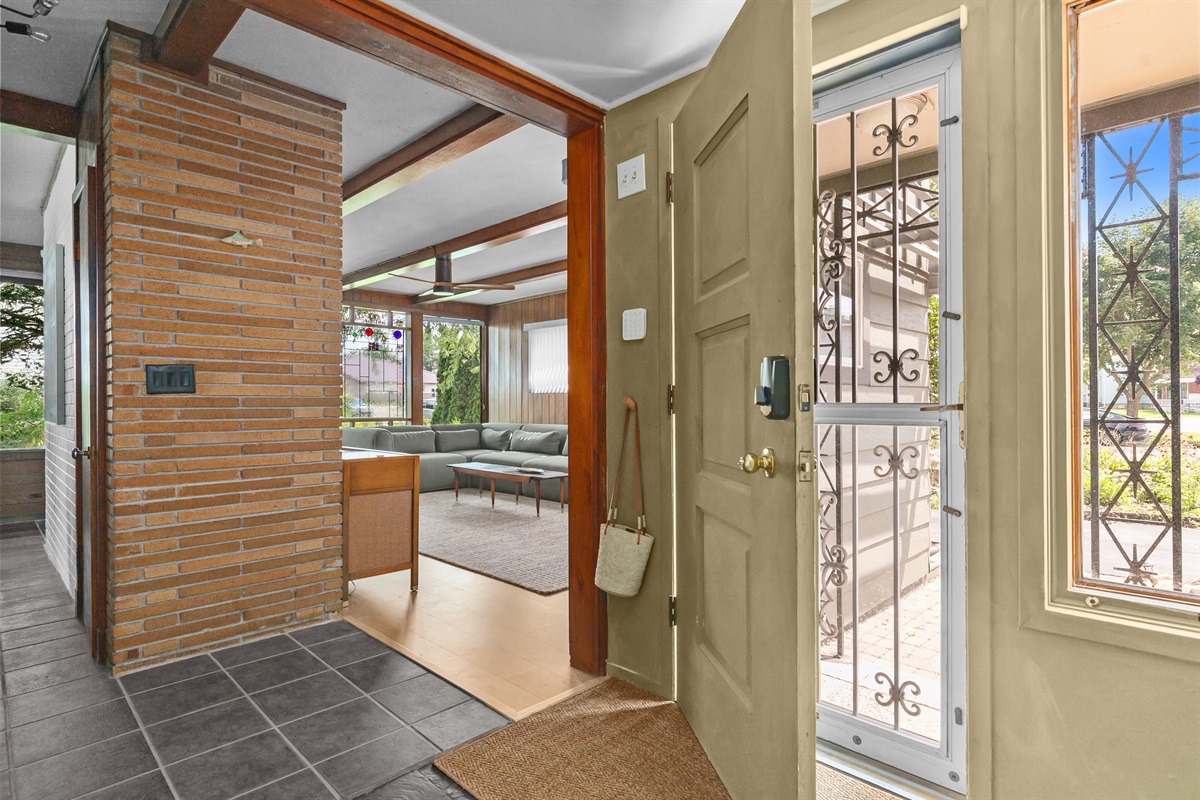 The living room is the first space to greet you as you enter the home, offering a cozy and welcoming place to gather and relax.