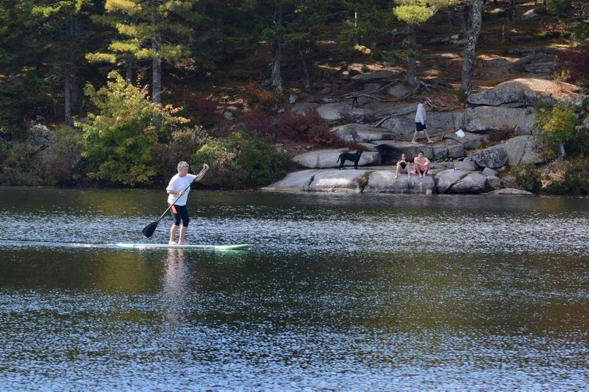 People of all ages having fun at our swimming hole.