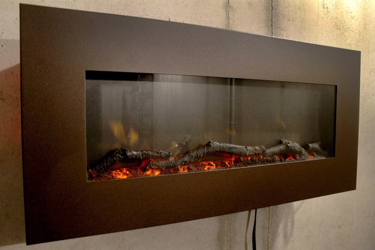Electric fireplace in tornado shelter / secondary living area on lower level can provide a bit of heat on colder days
