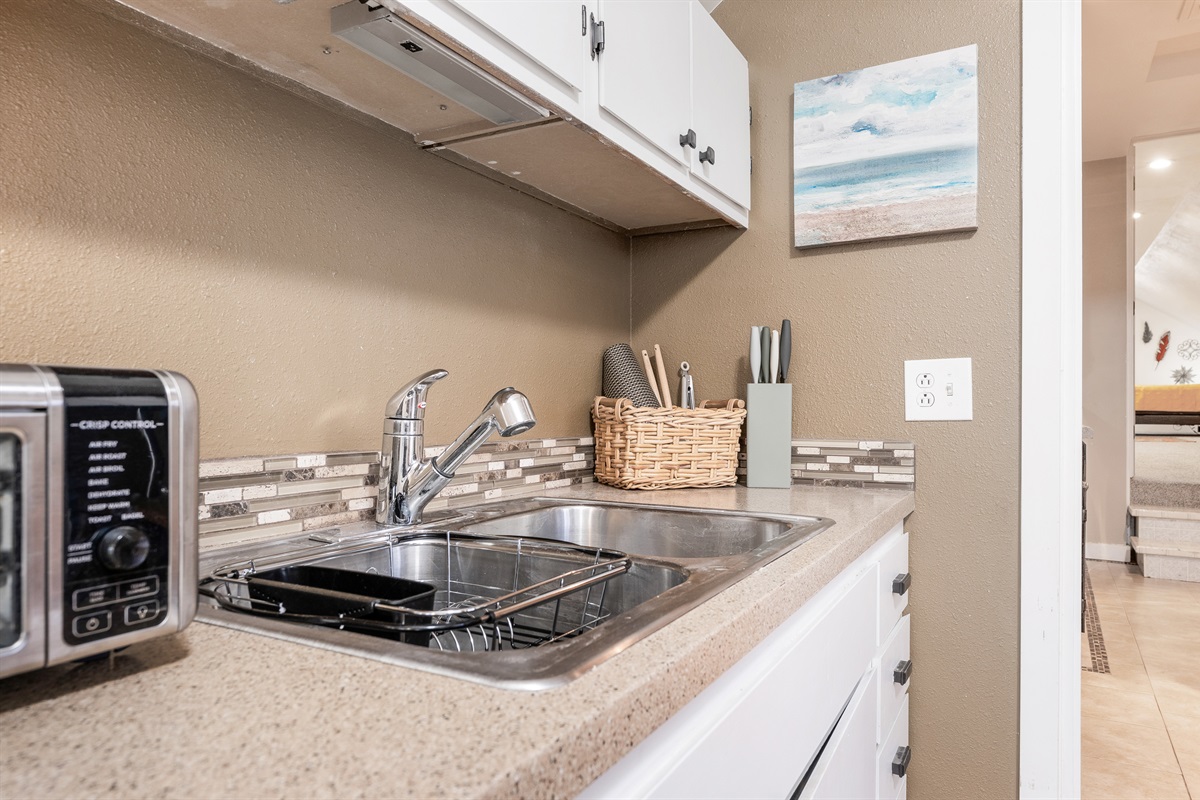 Stocked with dishes, pots & pans and more