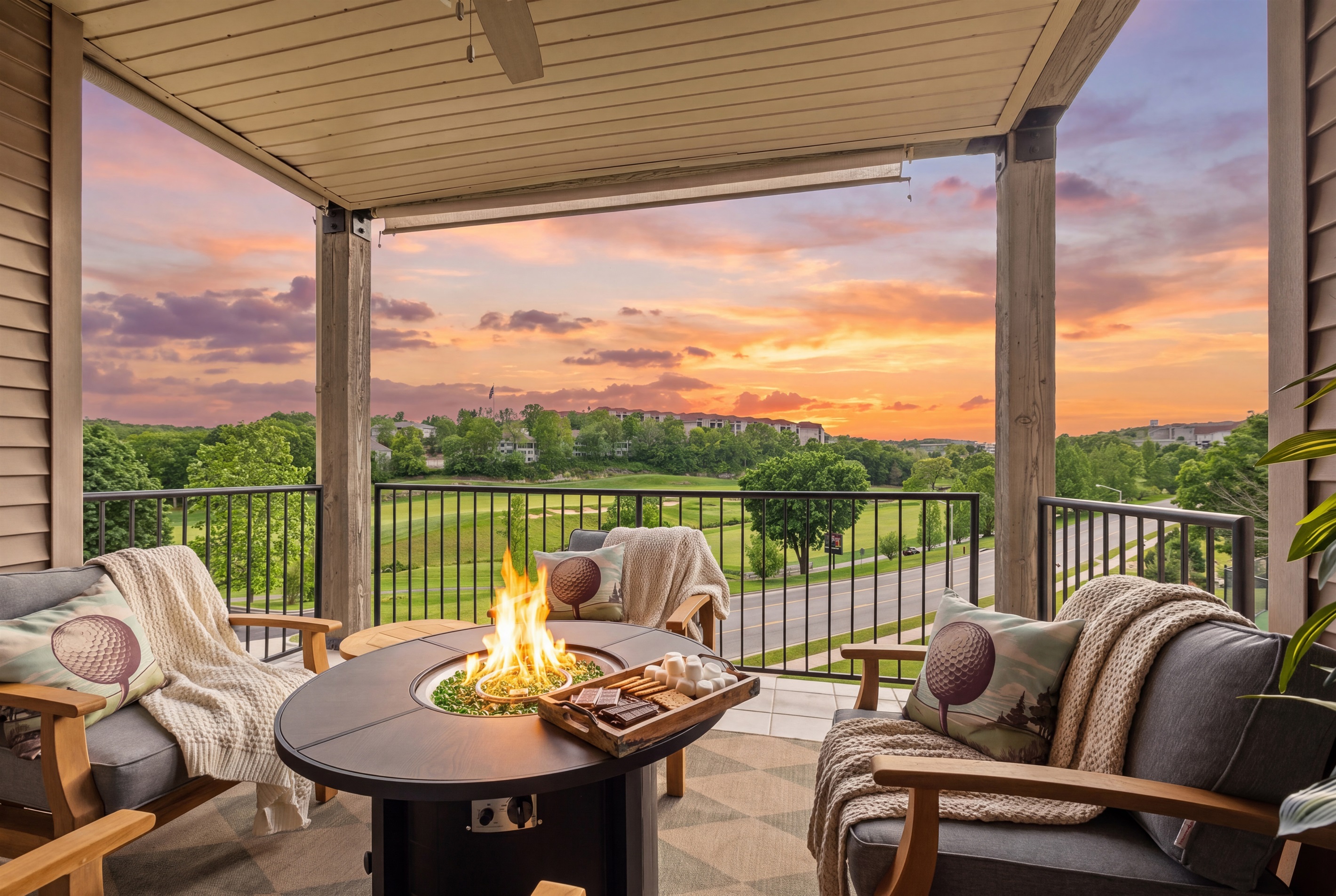 The back patio is perfect for relaxing in the evening and entertaining with comfy chairs and propane fire table