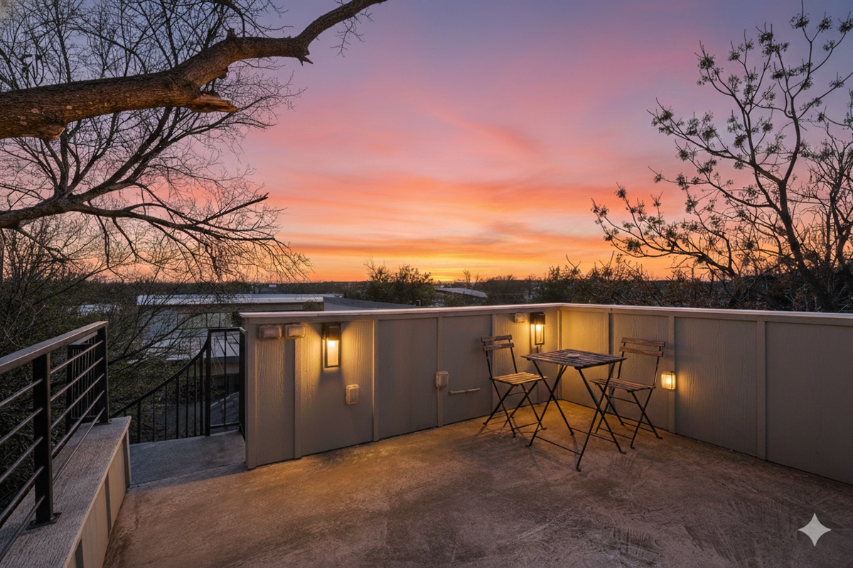 Private terrace with outdoor seating and beautiful sunset views