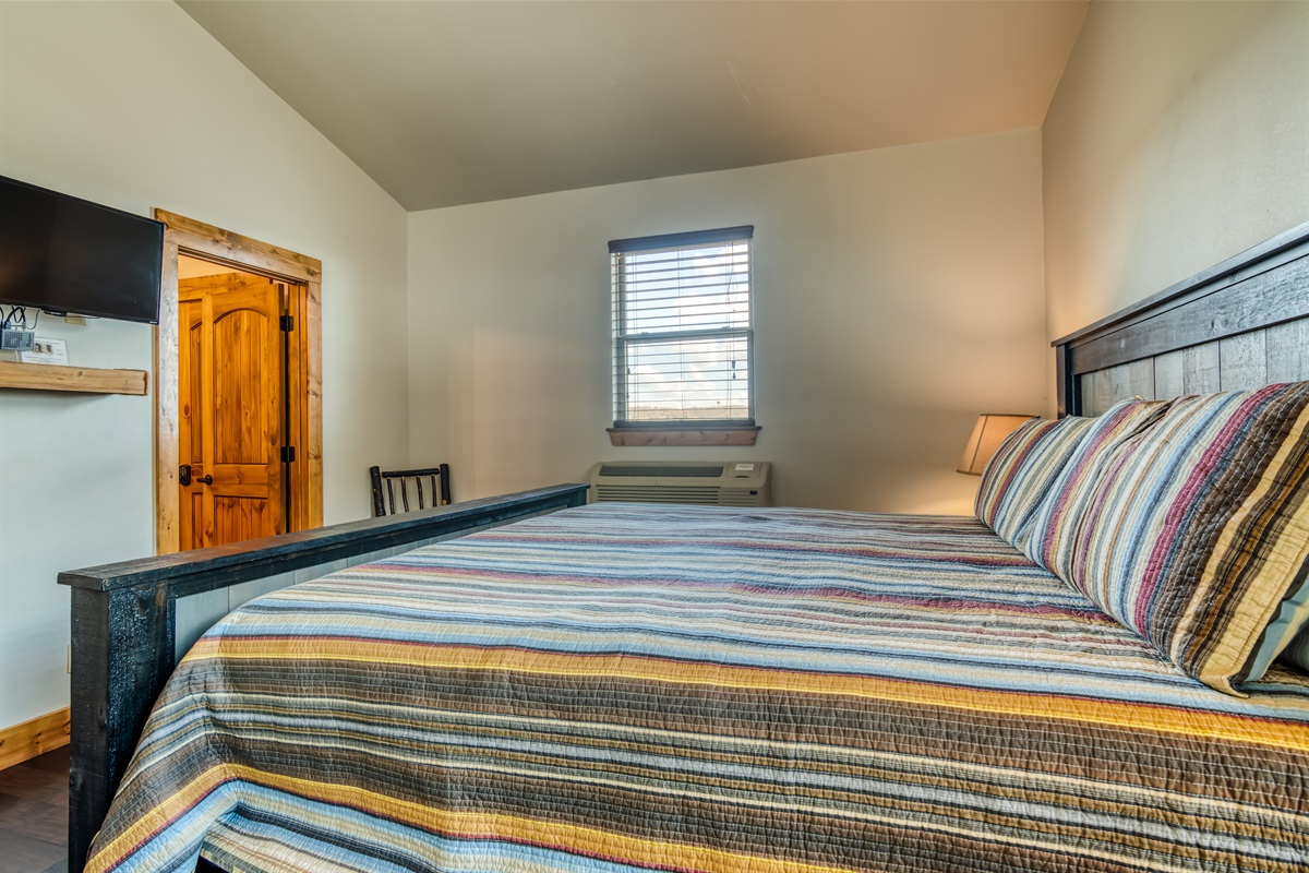 Upper level bedroom with King and queen beds
